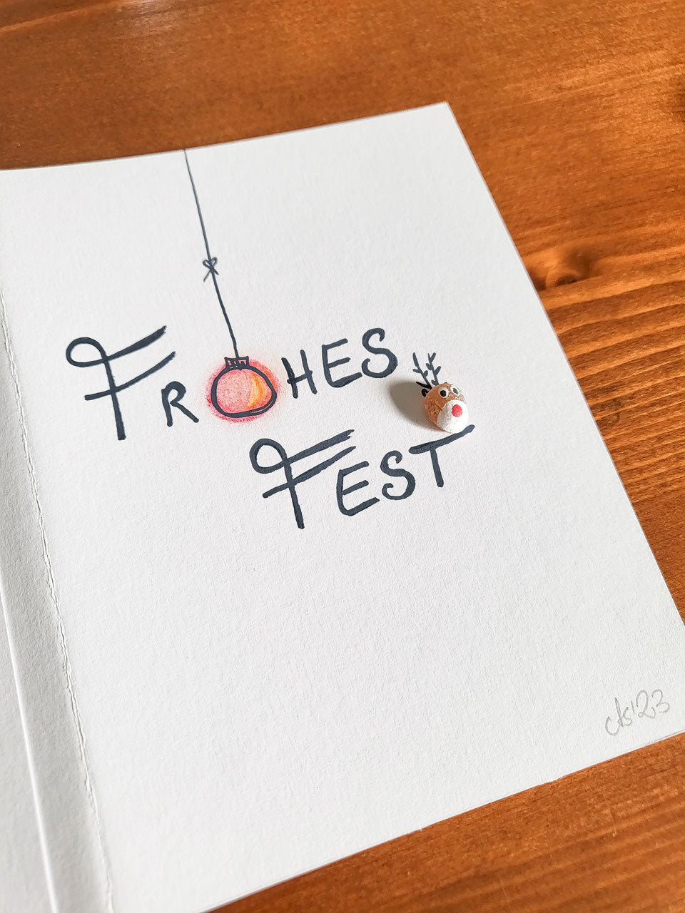 Weihnachtskarten mit Rentieren - mit echten Fossilien aus der Ostsee