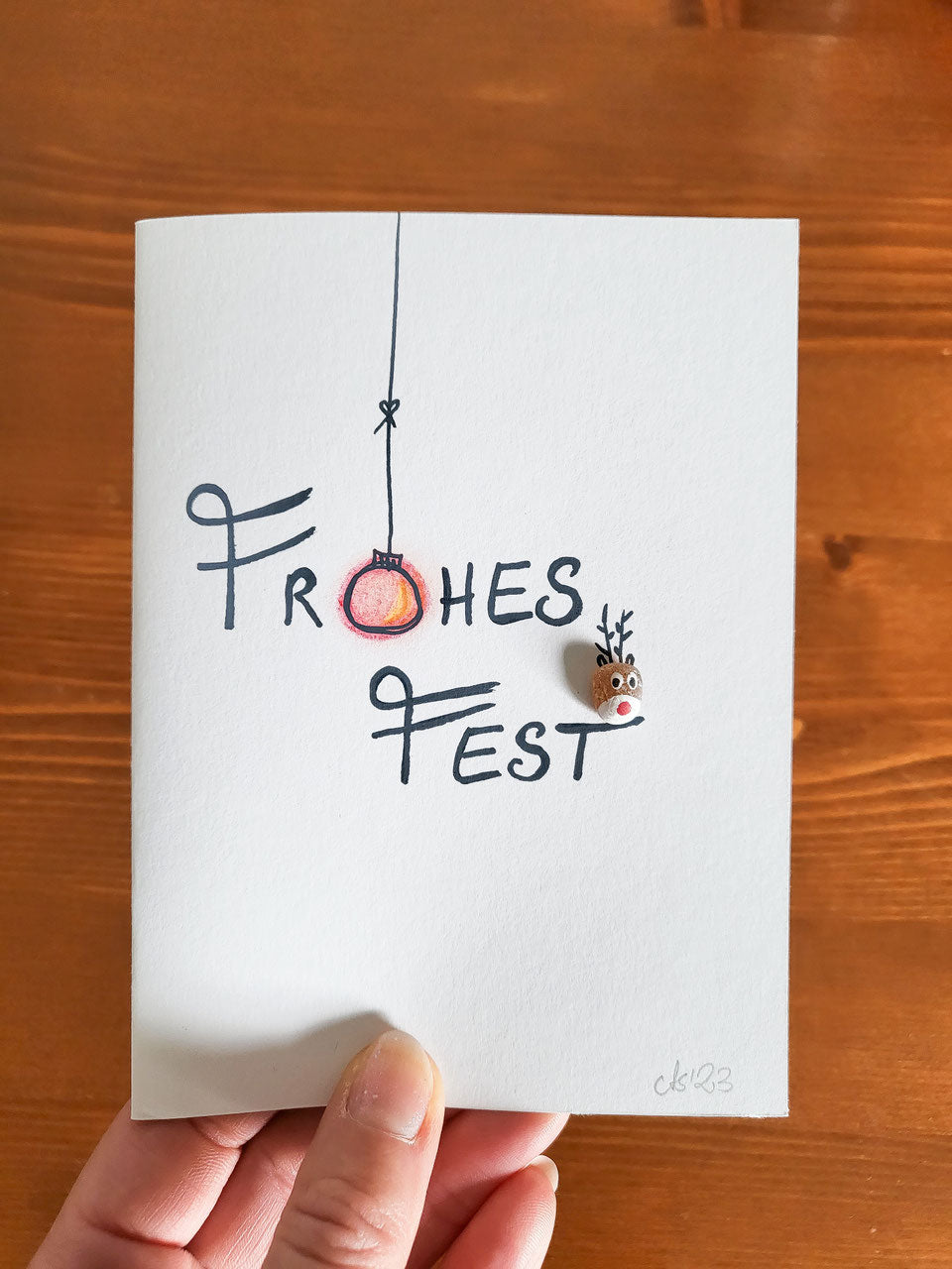 Weihnachtskarten mit Rentieren - mit echten Fossilien aus der Ostsee