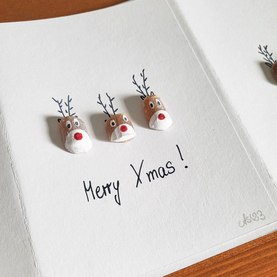 Weihnachtskarten mit Rentieren - mit echten Fossilien aus der Ostsee