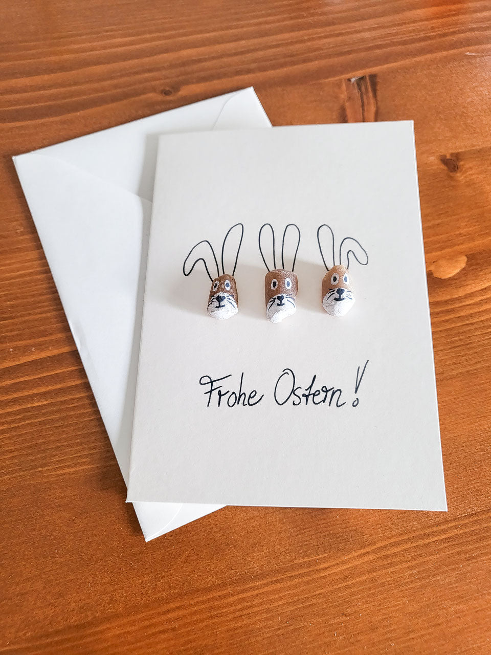 Handgemalte Osterkarte mit echtem Seeglas und Steinen von der Ostsee