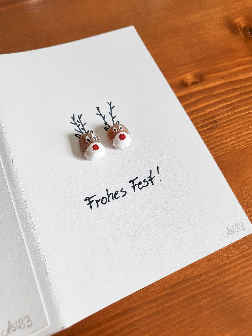 Weihnachtskarten mit Rentieren - mit echten Fossilien aus der Ostsee