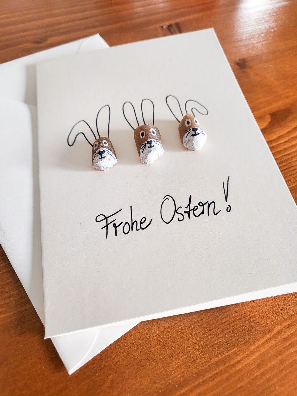 Handgemalte Osterkarte mit echtem Seeglas und Steinen von der Ostsee