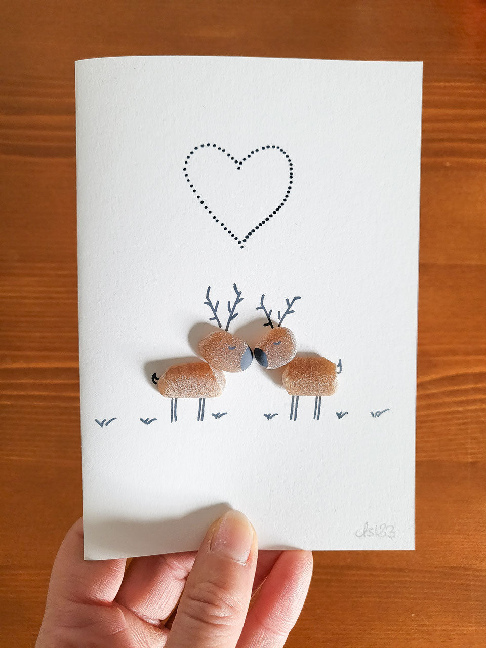 Weihnachtskarten mit Rentieren - mit echten Fossilien aus der Ostsee