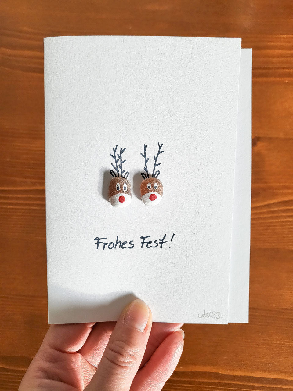 Weihnachtskarten mit Rentieren - mit echten Fossilien aus der Ostsee